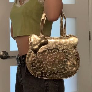 SOLD ! Gold Hello Kitty Bag